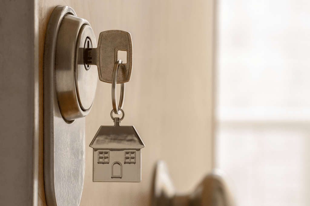 Kingfisher Landlord Insurance - images shows key and house keyring in lock