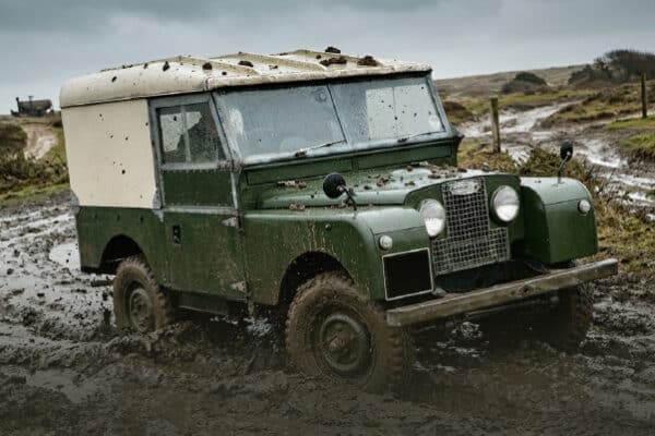 Land Rover Series One car in mud